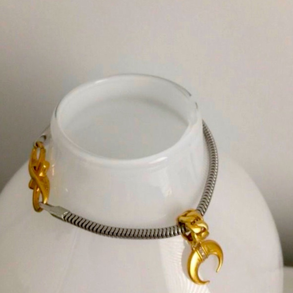 Sterling S. bracelet with gold charm and clasp & trendy bag - Jennifer Lopez.